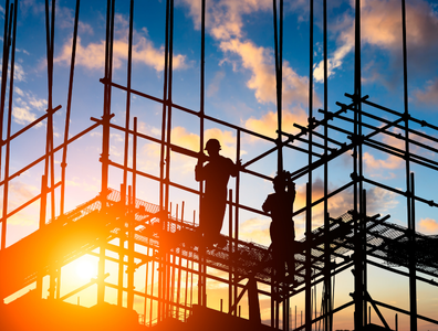 two men working on a construction site
